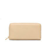 Portafoglio da donna in pelle martellata beige, chiusura laterale con zip, interno in cuoio naturale, prodotto da Pianigiani.